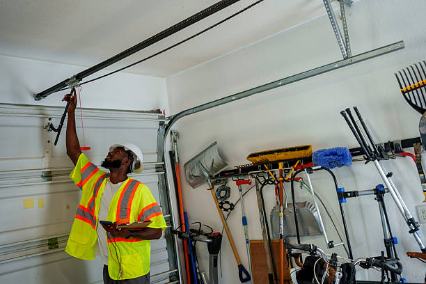 Professional Garage Door Panel Replacement technician working in Parkersburg, IA